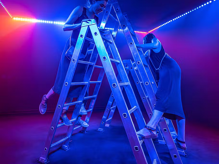 Dark matter people climbing stairs in exhibition room