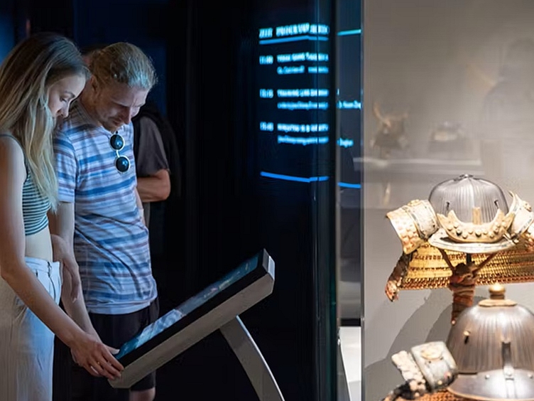 Samurai museum berlin looking at information display
