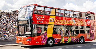 Hop on Hop off bus at East Side Gallery cover image