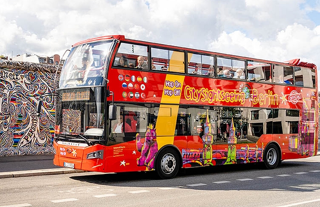 Hop on Hop off bus at East Side Gallery cover image