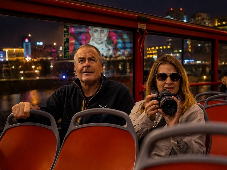 Berlin Tour of Lights City Sightseeing visitors on bus tour horizontal crop